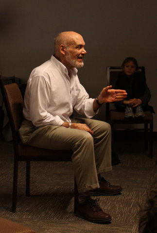 Bruce Coville, telling a story, seated